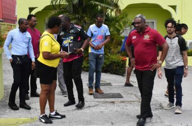 Personnel from the Ministry of Sports and other agency representatives prepare for the event [Photo credit: MYDS]