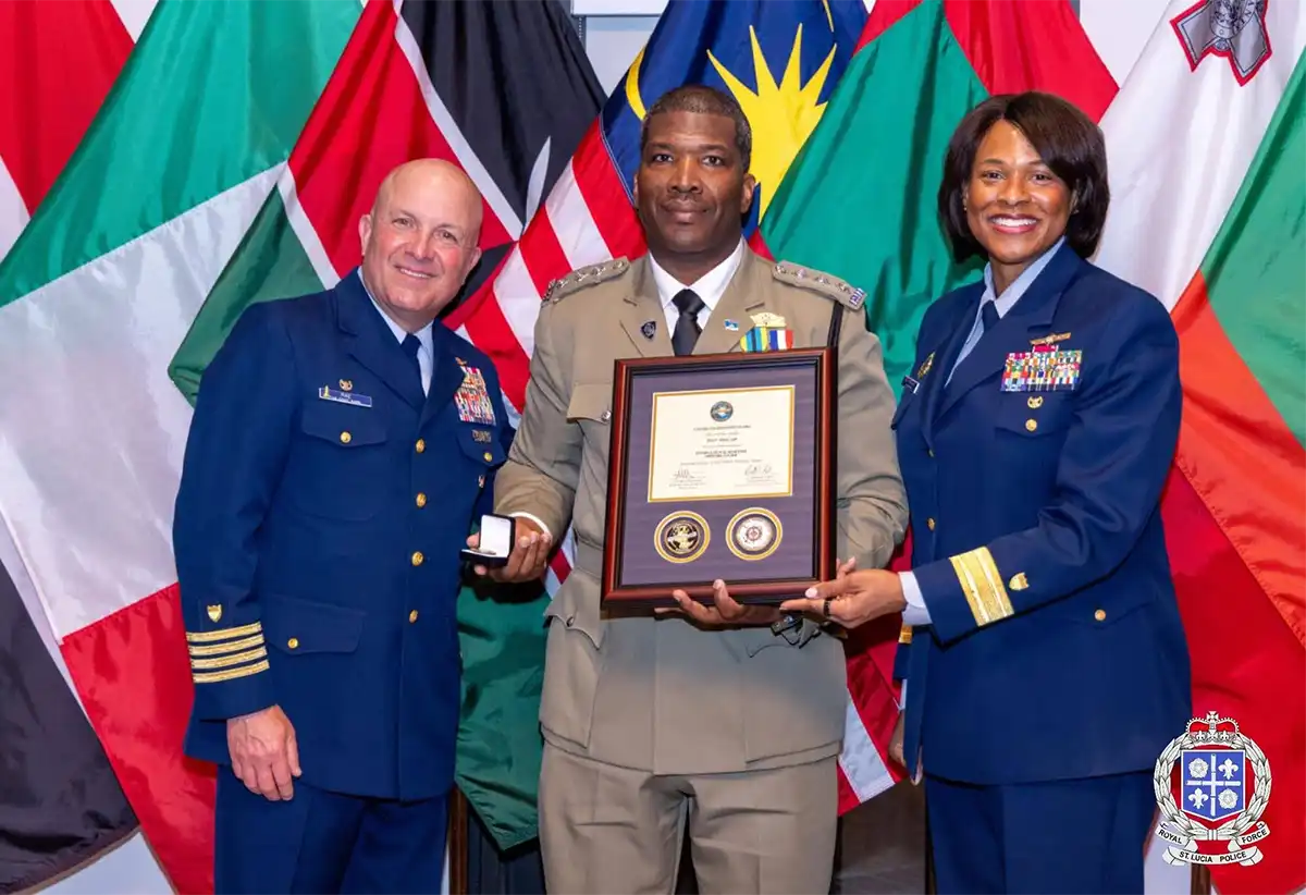 Superintendent Irvin Alfred, Commander of the Police Marine Unit receives his award