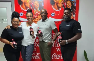 Coca-Cola FWC SLU Winner Tyrone Harris with Heineken Saint Lucia Team