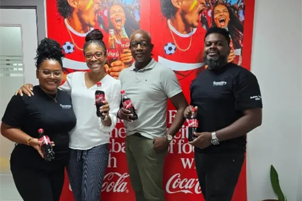 Coca-Cola FWC SLU Winner Tyrone Harris with Heineken Saint Lucia Team