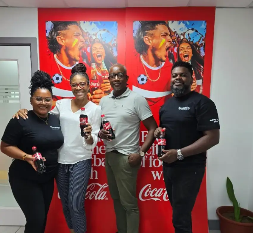Coca-Cola FWC SLU Winner Tyrone Harris with Heineken Saint Lucia Team