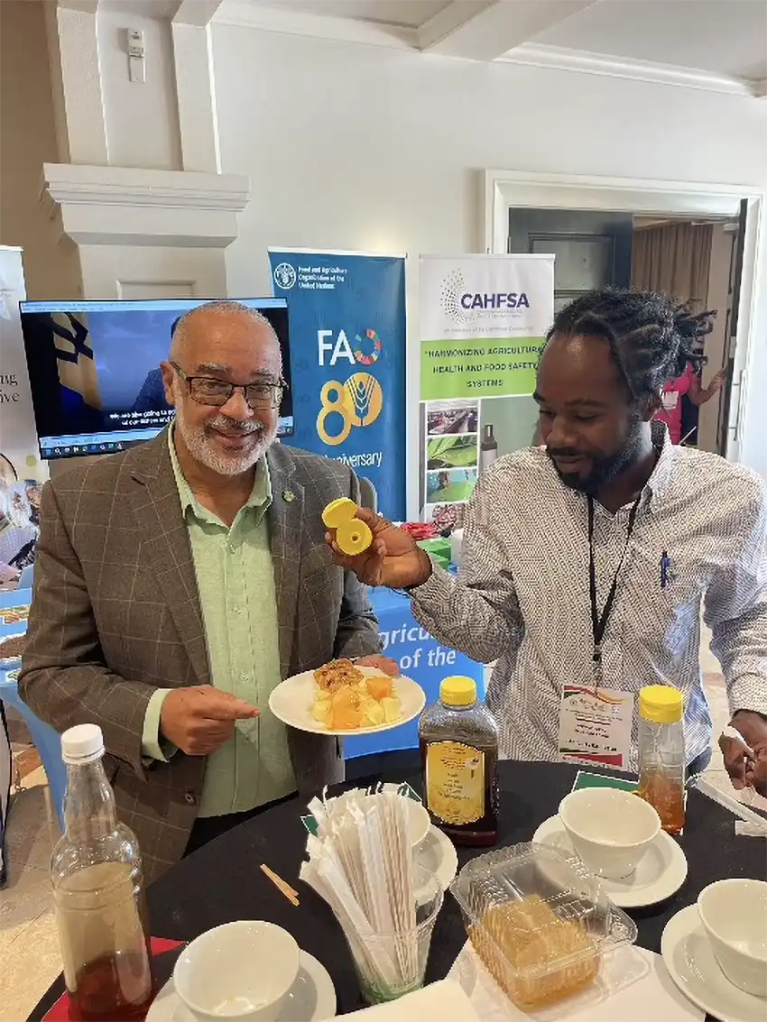 Dr. Didacus Jules – Director General of the OECS, partakes in OECS honey at the Caribbean Week of Agriculture and Honey Show in Saint Kitts & Neis, 2025.