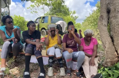 Honey Producers taking a rest after training and attending to their hives, Mon Repos, Saint Lucia.