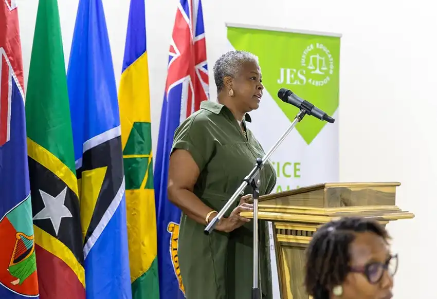 Mrs. Lyndel Archibald, Project Director from the Justice Education Society, delivers remarks