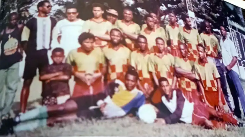 Champions VSADC with Stephen “Coolie” Darling stooping next to Micheal “Jah Youth” Raymond on match day.