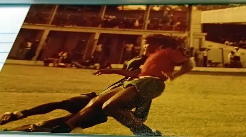 Coolie in motion with one on his ball winning tackles