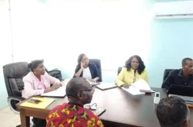Consumer Affairs Minister Emma Hippolyte (top) at the discussion table [Photo credit: Ministry of Equity]