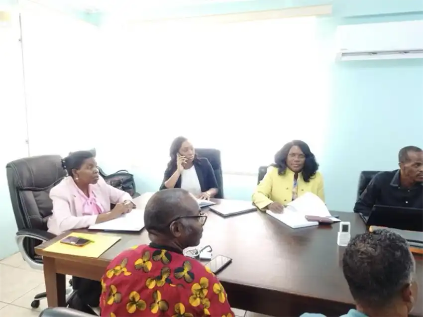 Consumer Affairs Minister Emma Hippolyte (top) at the discussion table [Photo credit: Ministry of Equity]