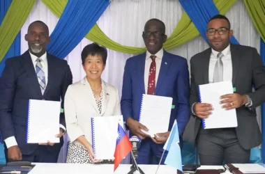 PM Philip Pierre alongside Taiwanese Ambassador and SLDB officials
