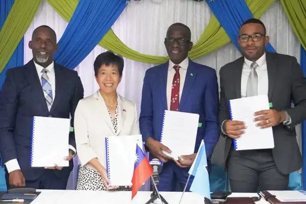 PM Philip Pierre alongside Taiwanese Ambassador and SLDB officials