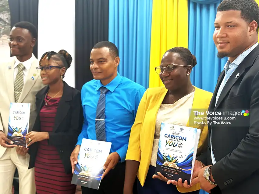 Left to right: Deputy CARICOM Youth Ambassadors for Saint Lucia Naeem Philbert and Davianne Alexander, Deputy Permanent Secretary in the Ministry of Youth Development and Sports Mr. Rohan Lubon, CARICOM Youth Ambassadors for Saint Lucia Shelly Desir and Alens Plante [Photo credit: The VOICE]