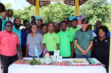 Mr. Edward Wilson, Production Officer with the Taiwan Technical Mission (TTM), and Mr. Johnson Yang, Senior Production Specialist at the TTM, with workshop participants at the miniball watermelon and bicolor corn workshop at the TTM’s Demonstration Farm on Thursday, September 3, 2026.