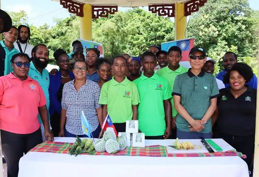 Mr. Edward Wilson, Production Officer with the Taiwan Technical Mission (TTM), and Mr. Johnson Yang, Senior Production Specialist at the TTM, with workshop participants at the miniball watermelon and bicolor corn workshop at the TTM’s Demonstration Farm on Thursday, September 3, 2026.