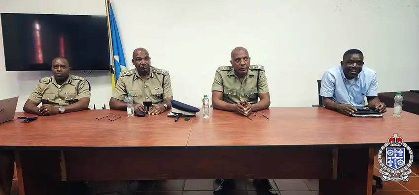 Police consult with mini-bus drivers at a recent meeting [Photo caption: RSLPF] 