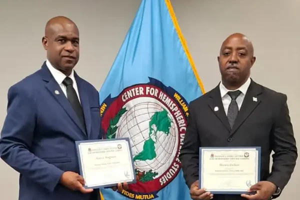 ASP Reece Auguste and Sgt. Shawn Delice of the PMU [Photo credit: RSLPF]
