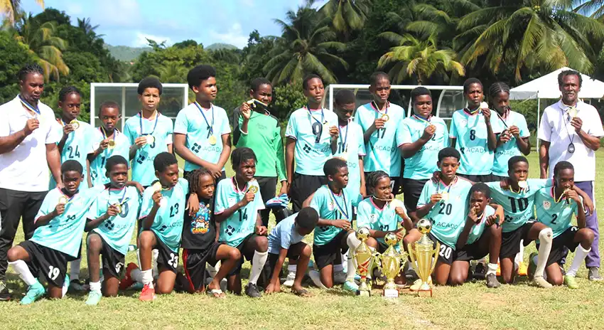 Mabouya Valley SLFA Inc. Primary Schools Boys Under-12 District League Champions with coaches. (Photo credit: SLFA)