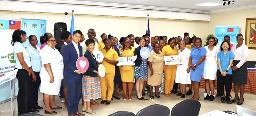 H.E. Nicole Su, Taiwan’s Ambassador to Saint Lucia, joins Hon. Moses Jn. Baptiste, Minister for Health, Wellness and Nutrition, and officials of the Health Ministry and the Taiwan Technical for a group photo at the handover ceremony. 