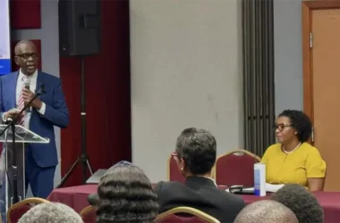 PM Philip J Pierre addresses attendees at businees forum [Photo credit: OPM]