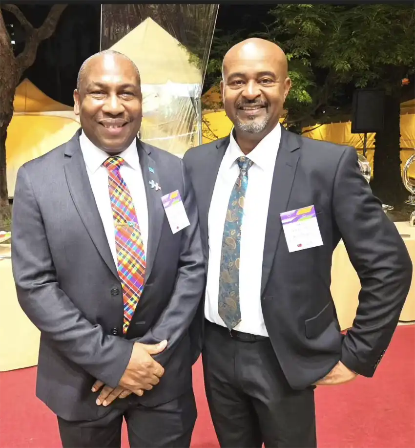 L-R Dr. Robert Lewis, St. Lucia’s Ambassador to Taiwan and Managing Editor of THE VOICE Publishing Co. Ryan Desir in Taiwan